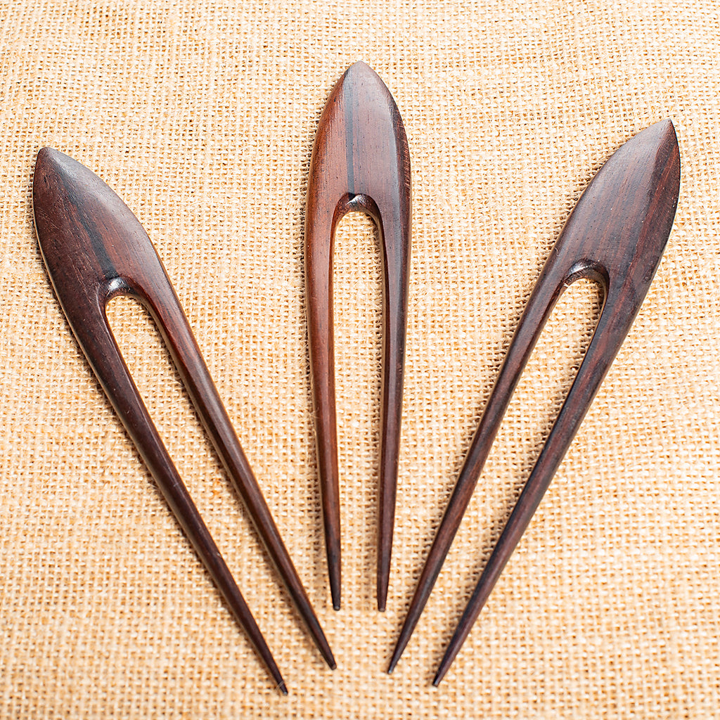 wooden double pronged hair stick with end curved to a point