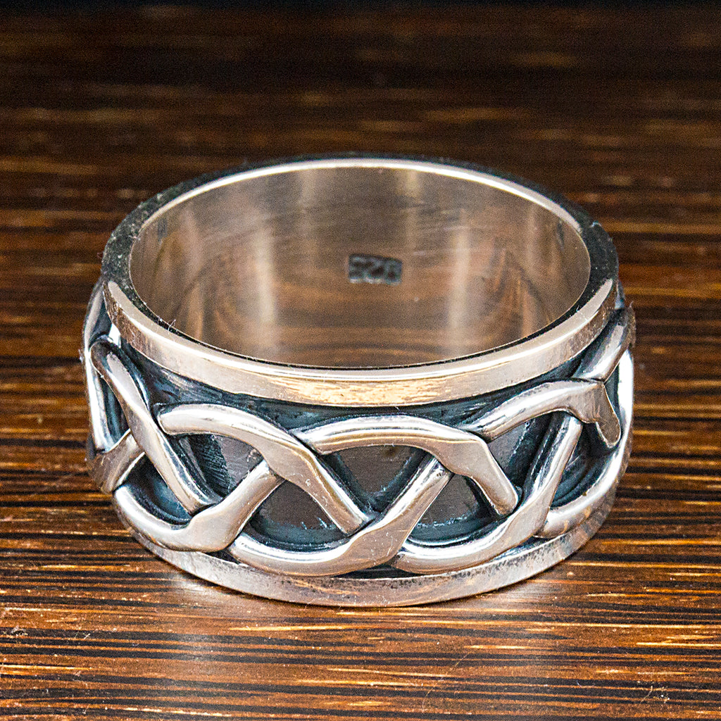 Sterling silver spinning celtic band ring