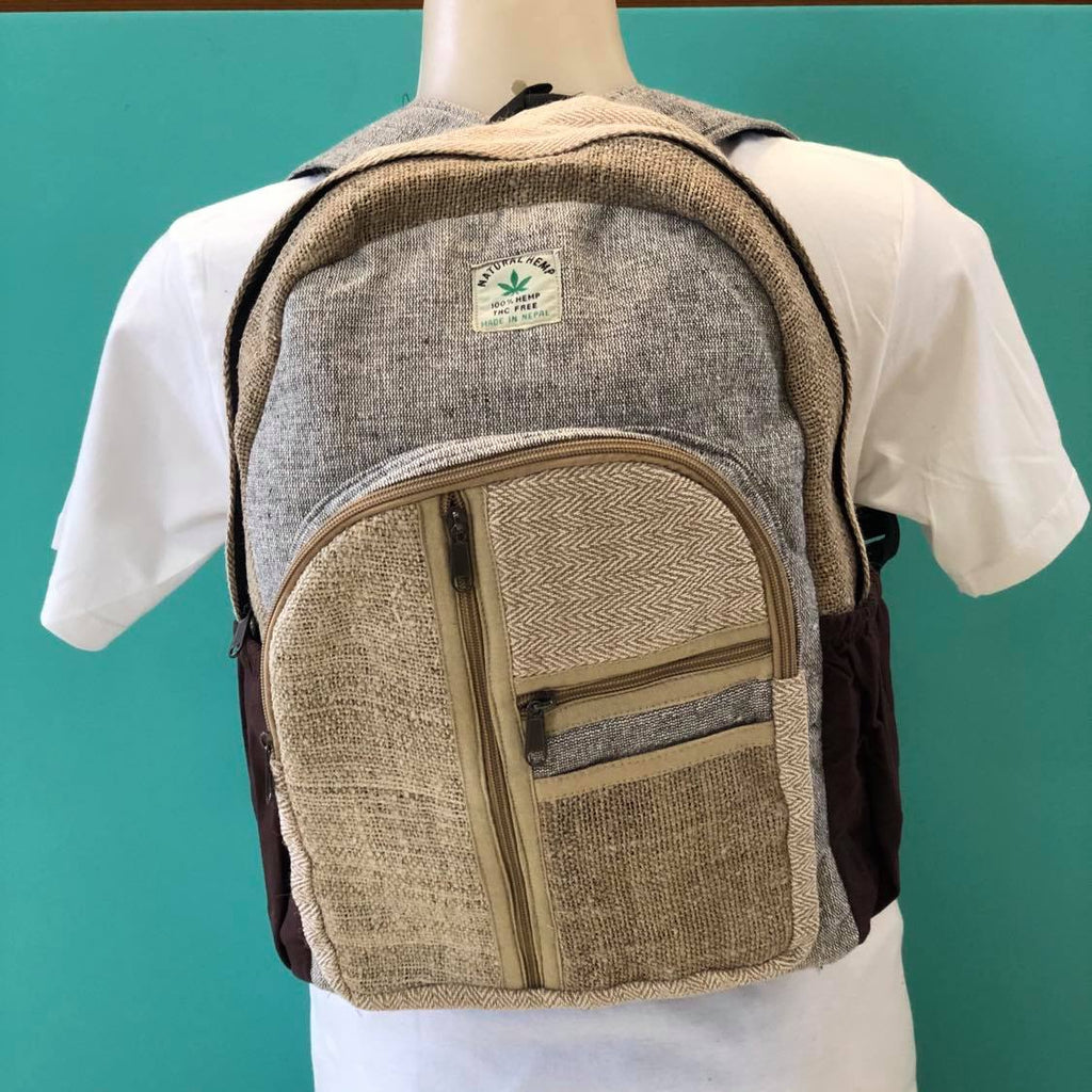 A backpack made from cotton and hemp with multiple pockets