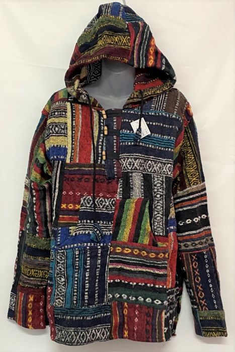 A patchwork hoodie made with different colours on a white background