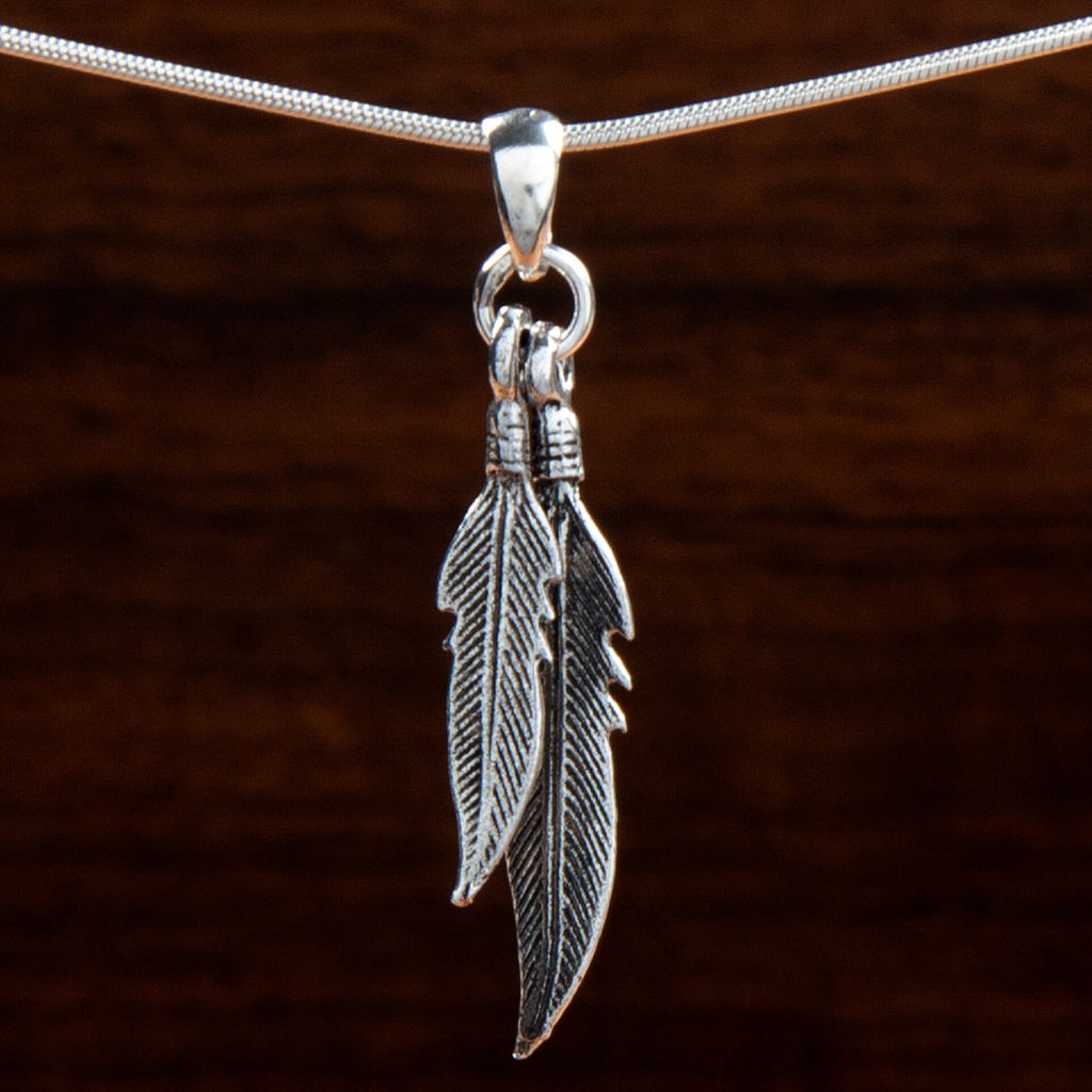 sterling silver double feather pendant