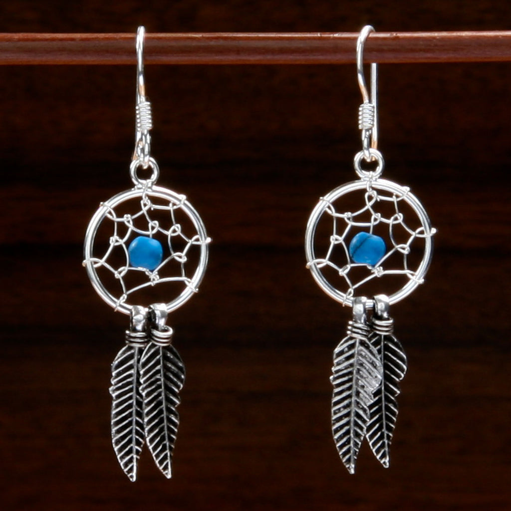sterling silver dream catcher pendant earrings with torquoise coloured stone at centre
