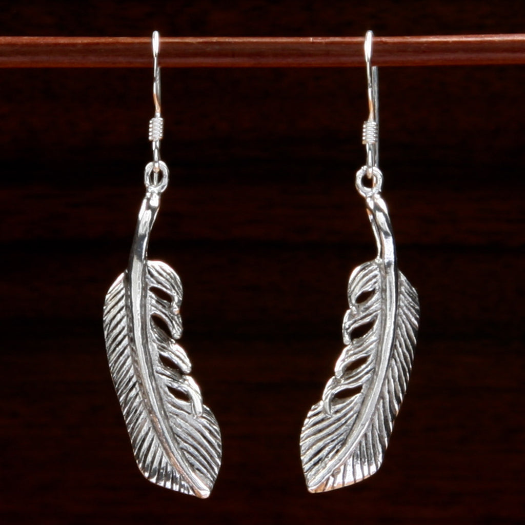 sterling silver intricately engraved feather shaped earrings