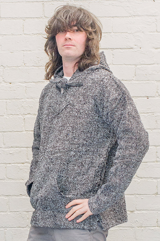 Model wearing a Charcoal Baja Hoodie from the front