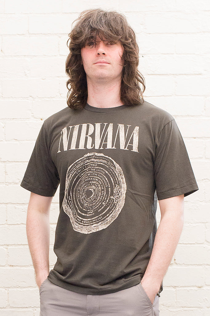 model wearing black cotton t-shirt with Nirvana logo and circle of hell graphic printed on front