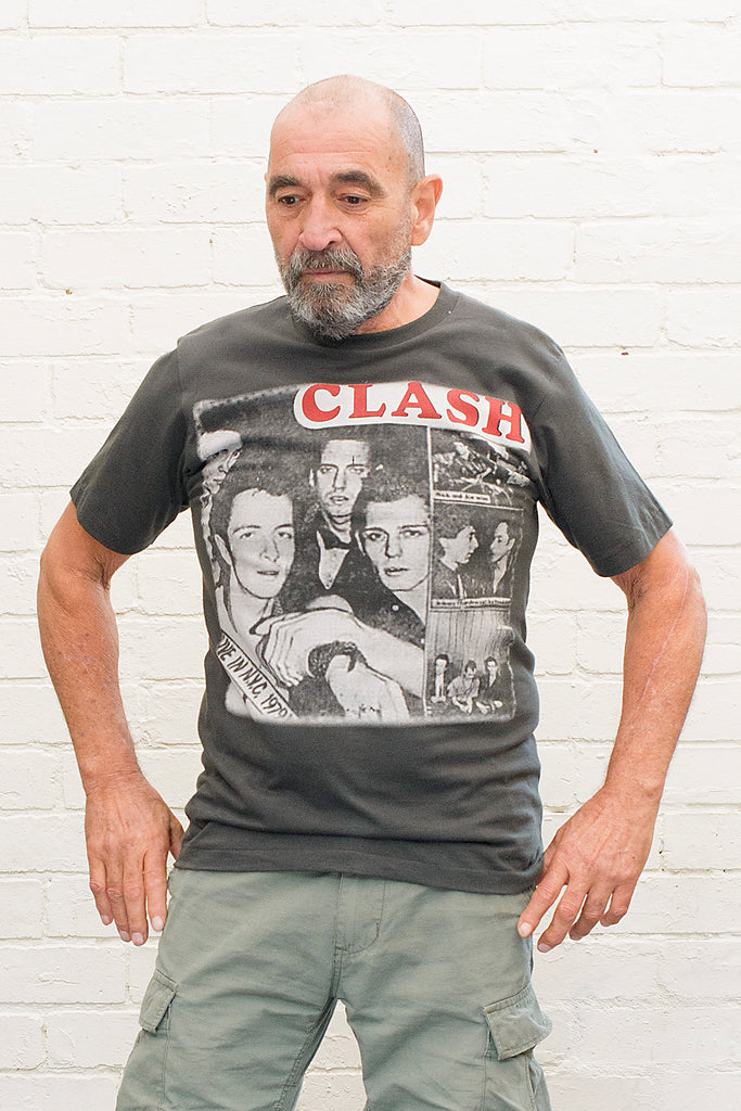 model wearing black cotton t-shirt with the clash lettering printed atop photographic images of the band in album cover format front