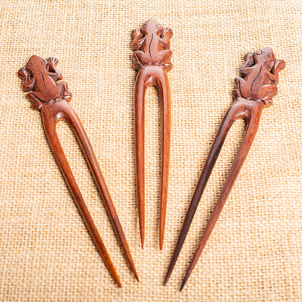 wooden double pronged hair stick with naive hand carved frog at end