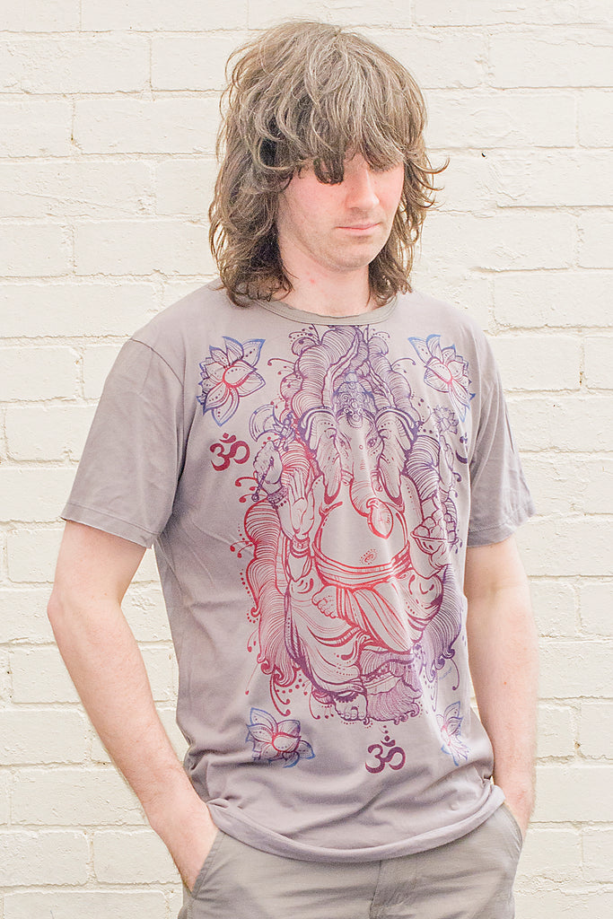 model wearing a grey T-shirt featuring a colourful ganesh line drawing design printed on the front in blue red and purple tones