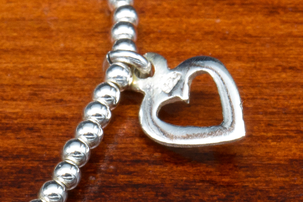 Sterling Silver multiple charm bracelet detail