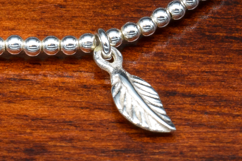 Sterling Silver multiple charm bracelet detail