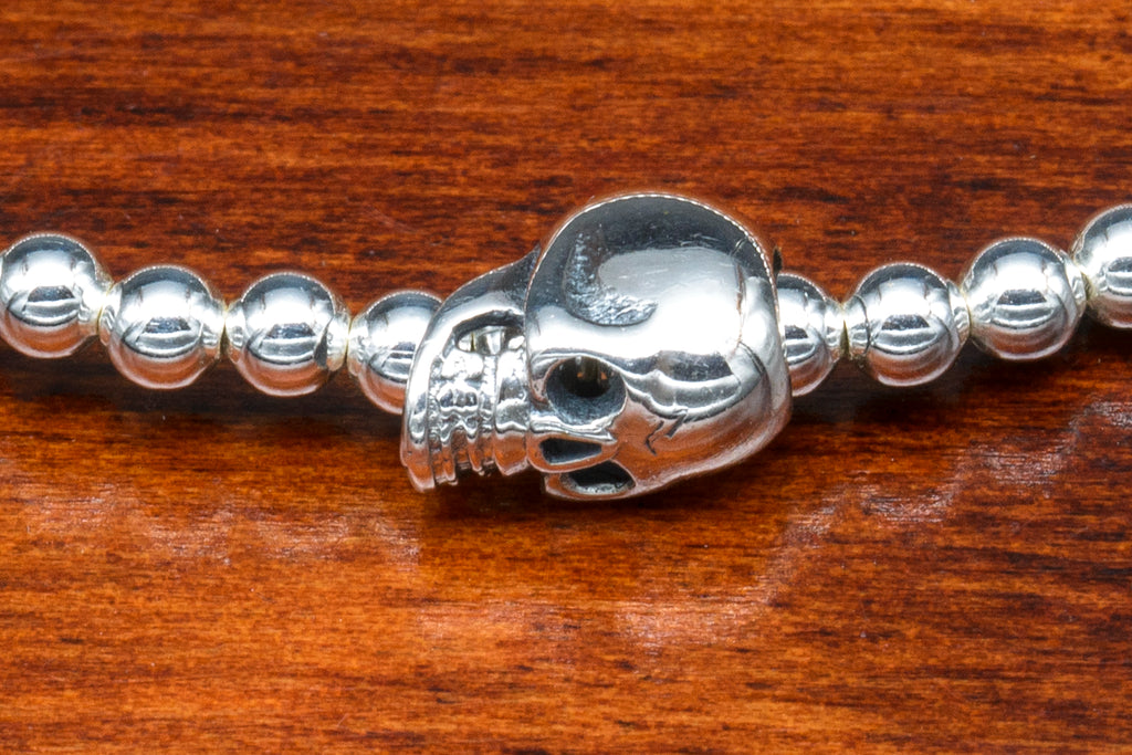 Sterling Silver Skull charm bracelet detail