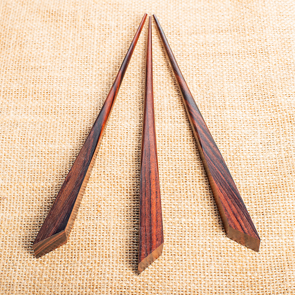 slender wedge shaped hair stick with squared edges and acute angled top