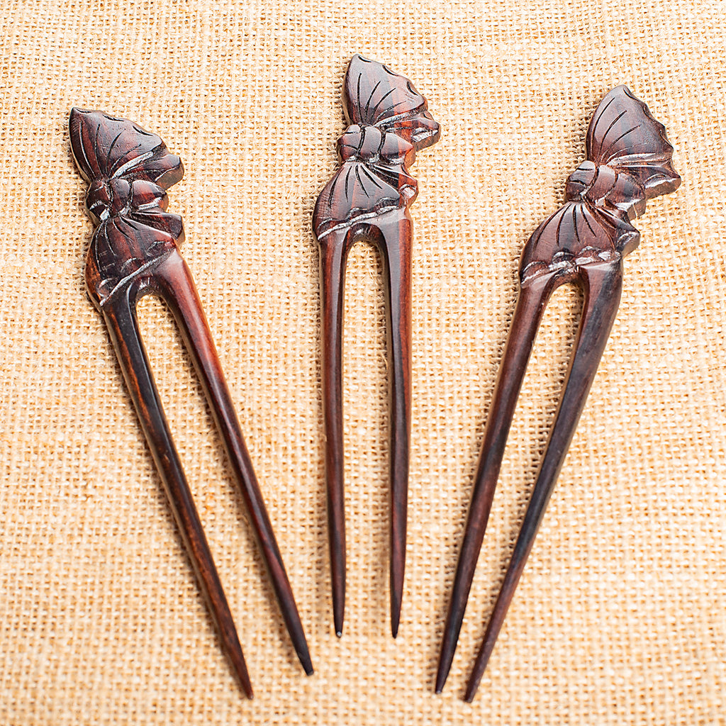 wooden double pronged hair stick with hand carved butterfly at end