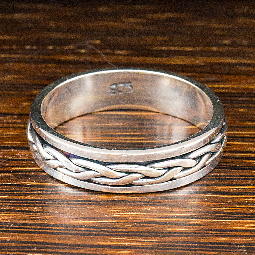 Sterling silver spinning ring with braided band detail