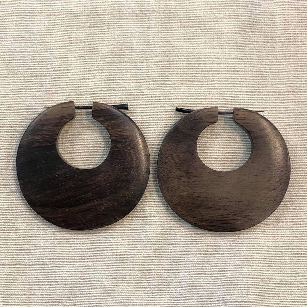 Two hooped earrings crafted from rosewood 