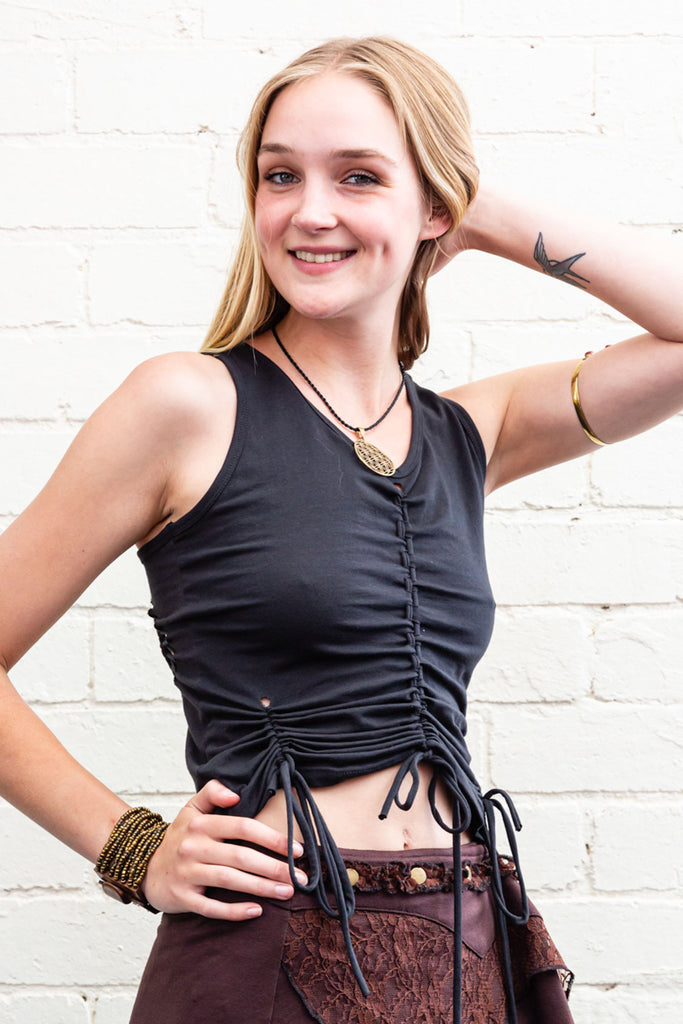 Maia slit-weave singlet tank corset top with dangling ties at sides and midriff in black front