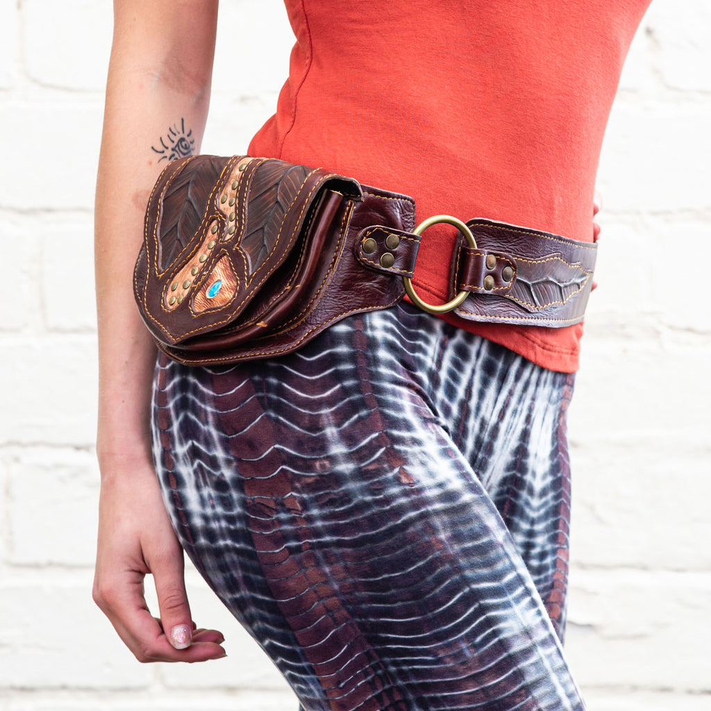 A leather pocket belt featuring a leaf boho design, side