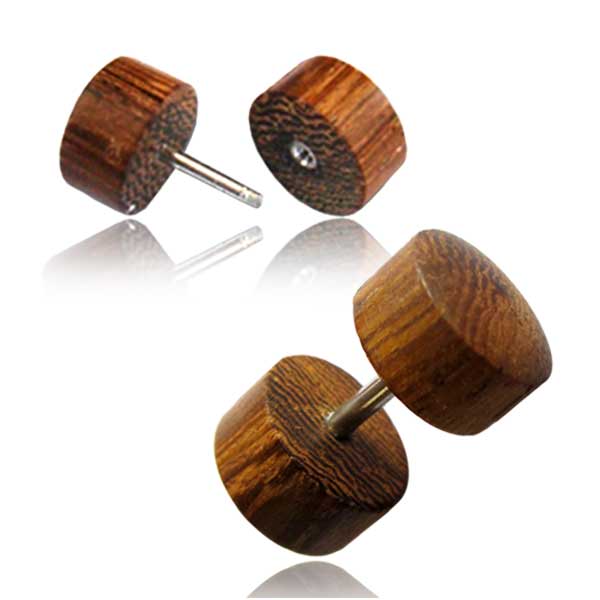 Two wooden fake plug earrings on a white background