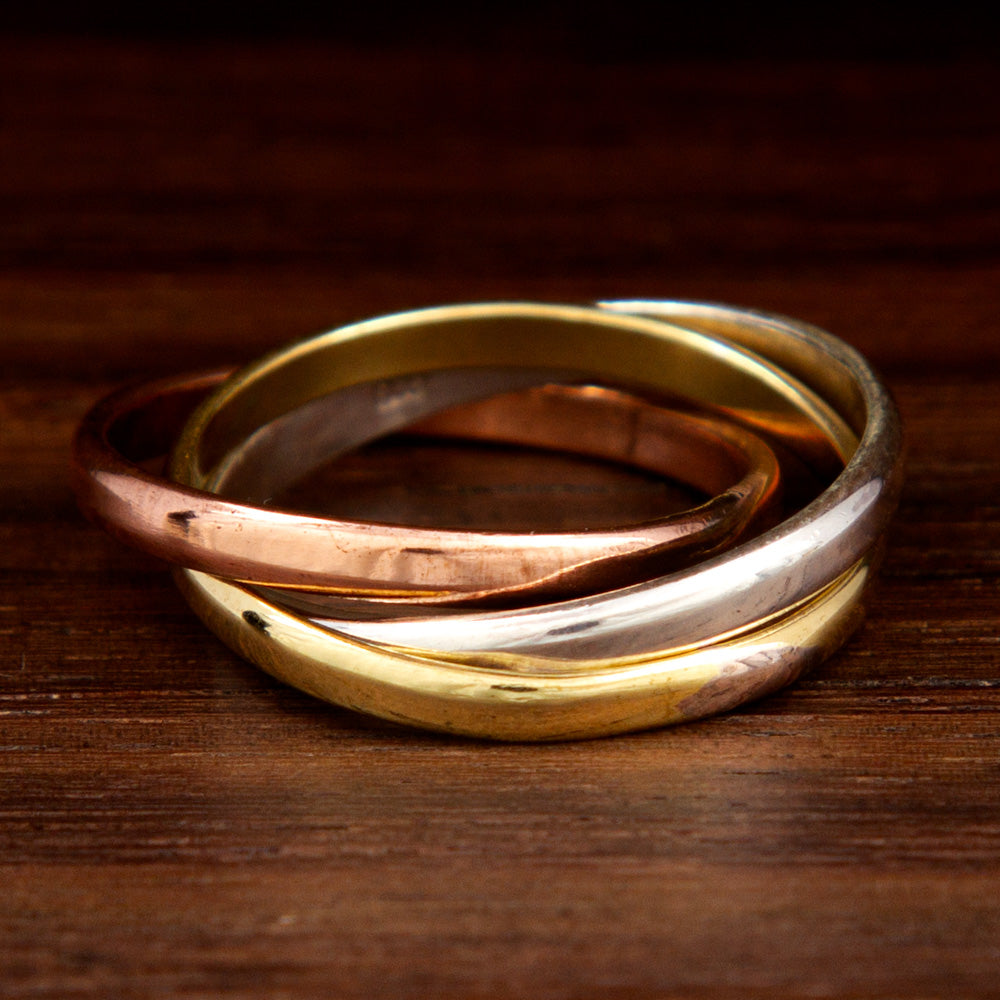 Three classic band rings: copper, silver and brass