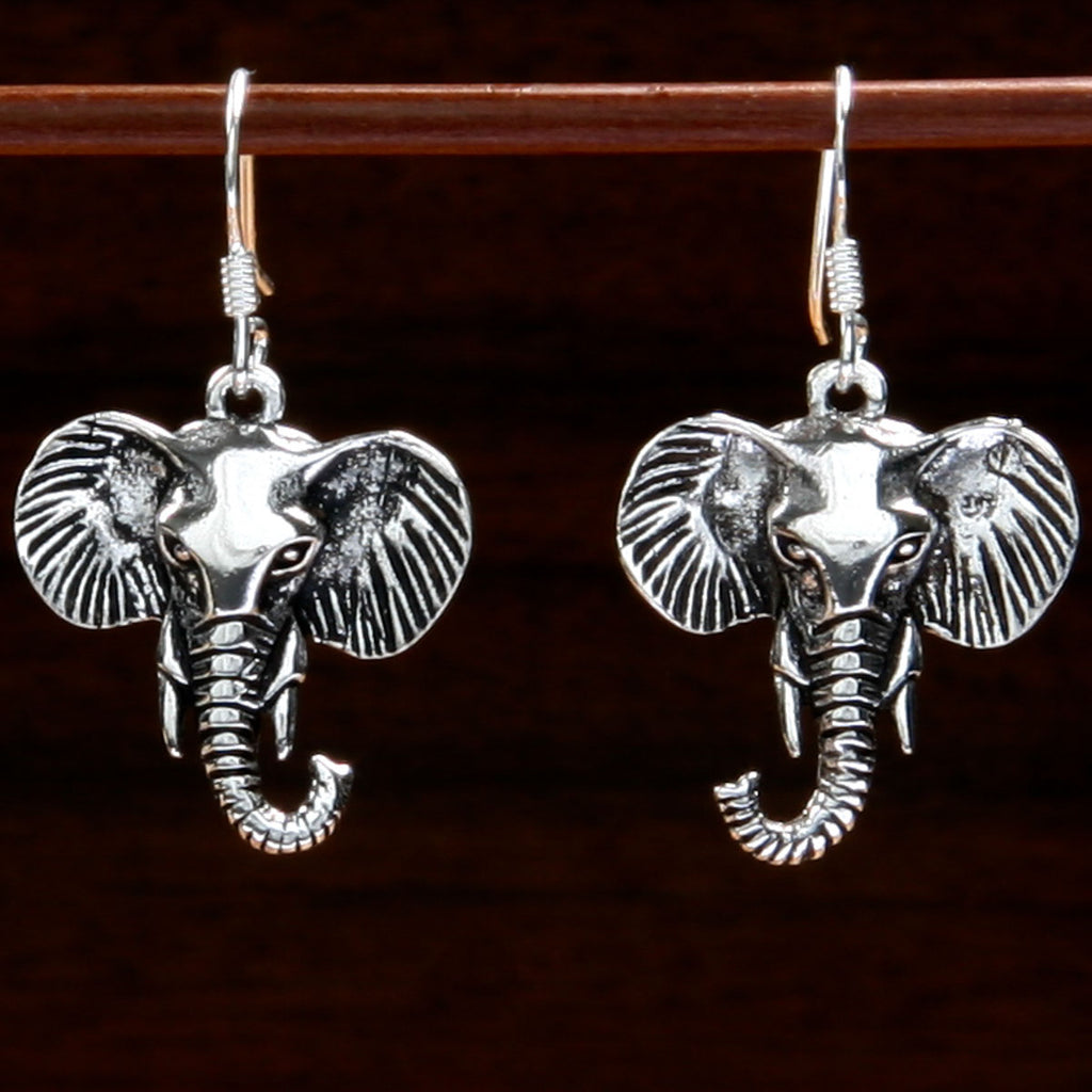 sterling silver tusked elephant's head earrings