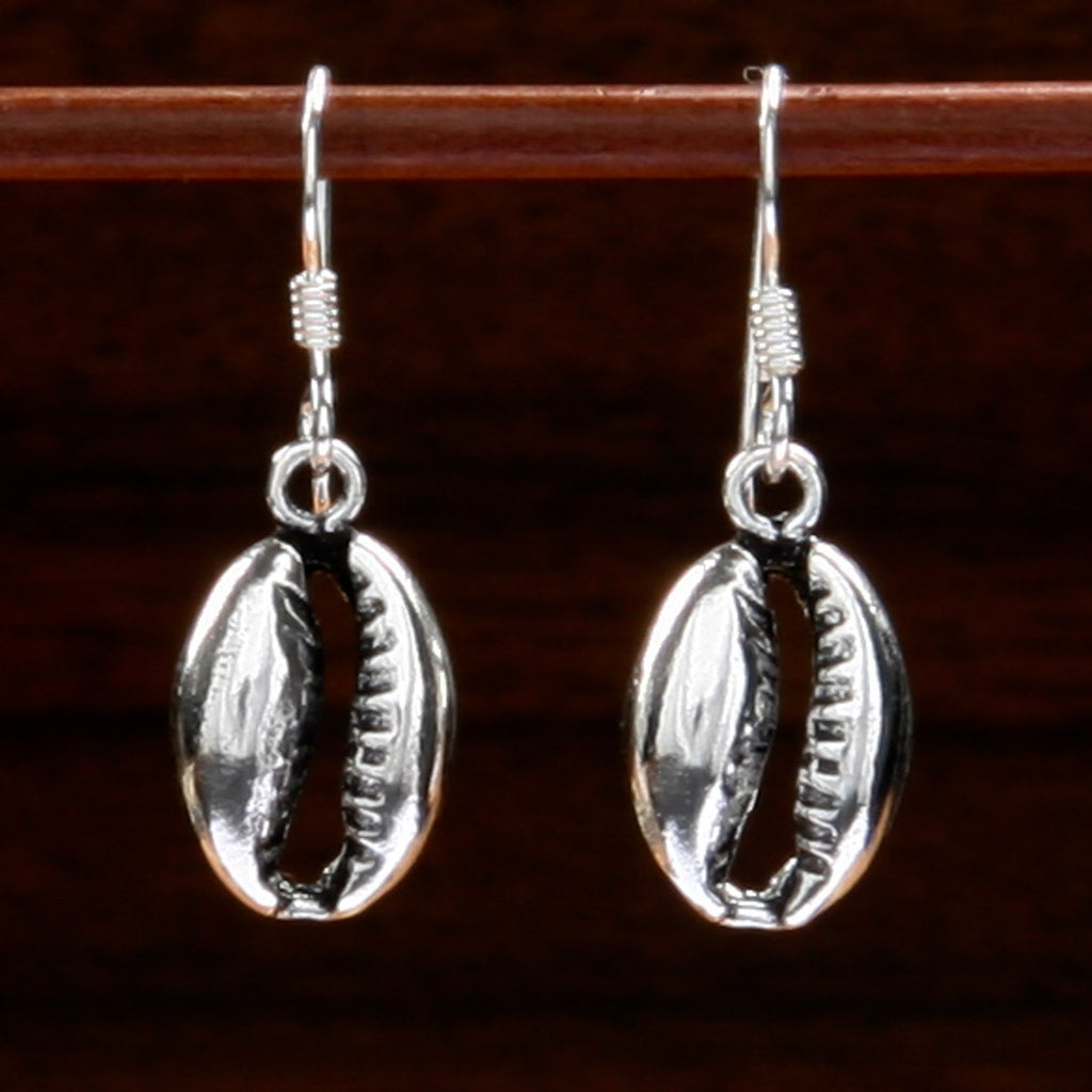 sterling silver earrings shaped in cowrie shell design