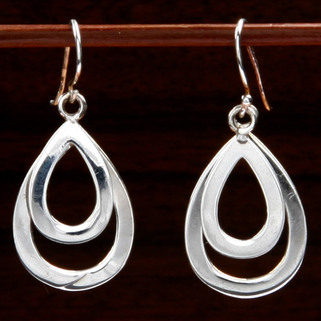 sterling silver double droplet earrings with one larger and one smaller droplet each