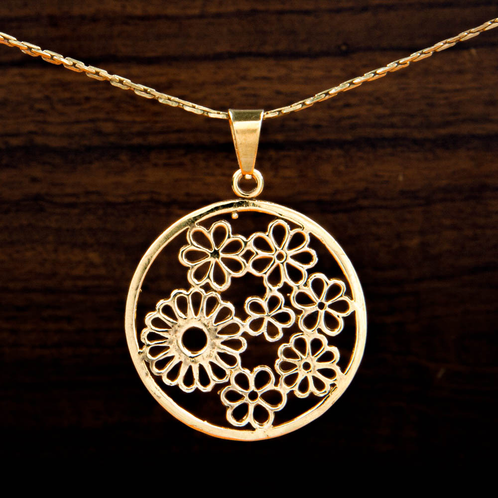 brass pendant with multiple flower design cut-out