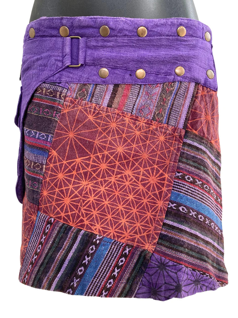 woven and printed stone wash cotton patchwork festival skirt in purple tones with studded waist and buckle detail