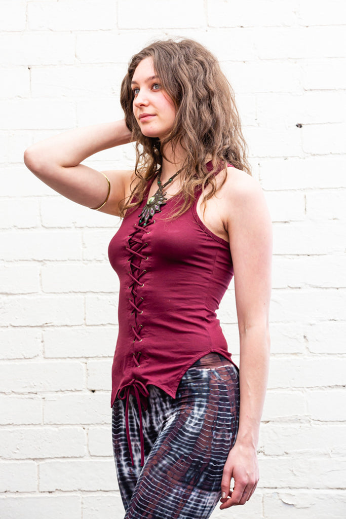 Maroon Freyja lace-up singlet top with pointed hem line front side